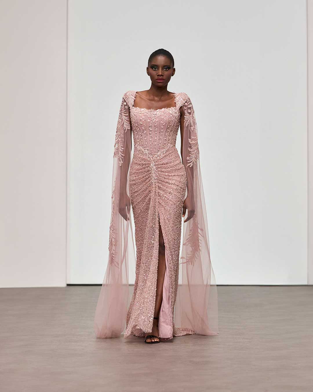 Regal Blush Pink Gown  Form-Fitting Dress with Sheer Sleeves and High Slit   Designers & Us